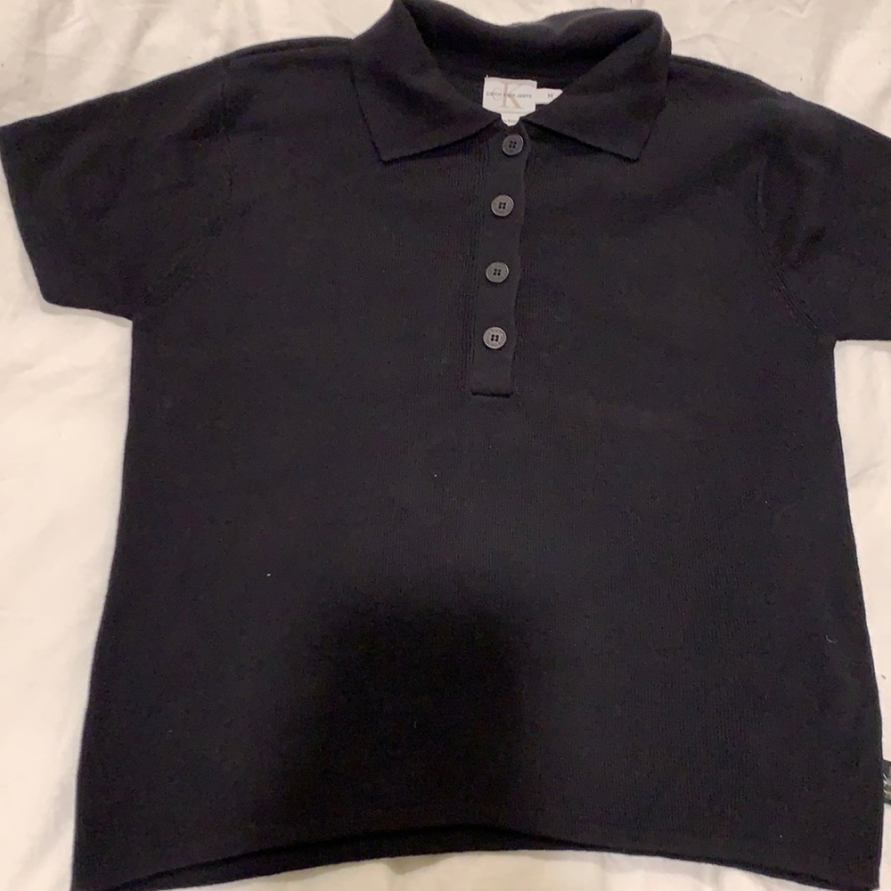 Calvin Klein black 💯cotton top sz M  fits snugl